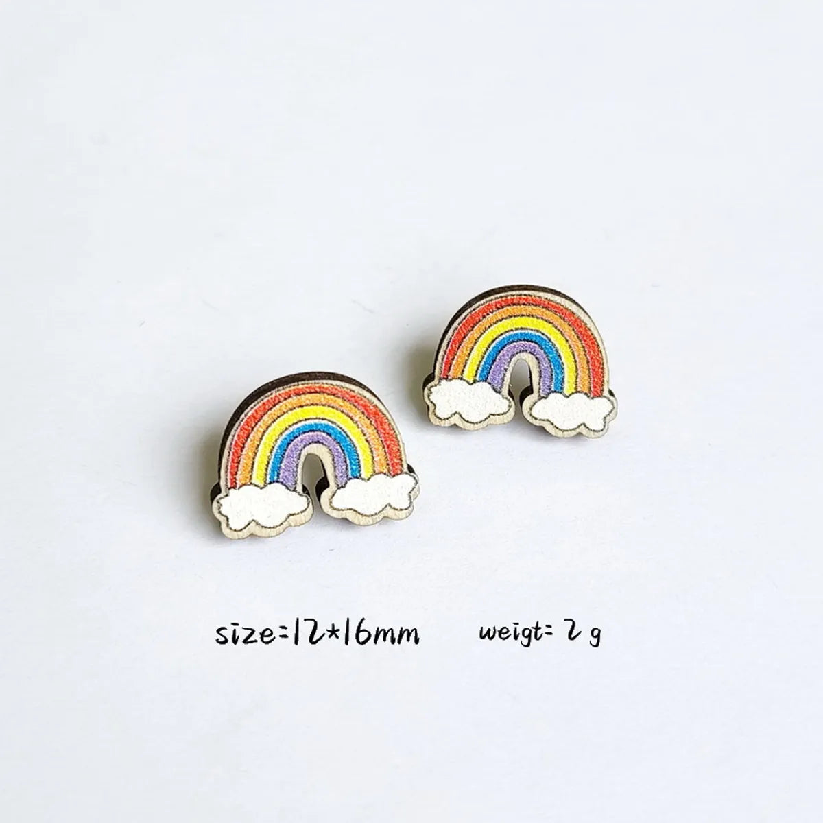 1 Pair Cartoon Style Book Rainbow Apple Wood Printing Women'S Ear Studs