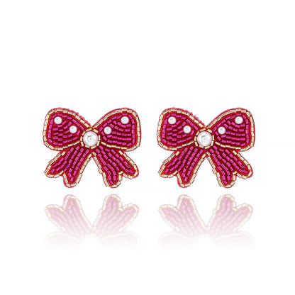 1 Pair Casual Elegant Simple Style Bow Knot Inlay Beaded Seed Bead Artificial Pearls Ear Studs