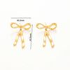 1 Pair Casual Retro Geometric Heart Shape Bow Knot Hollow Out Inlay Titanium Steel Pearl Zircon Earrings