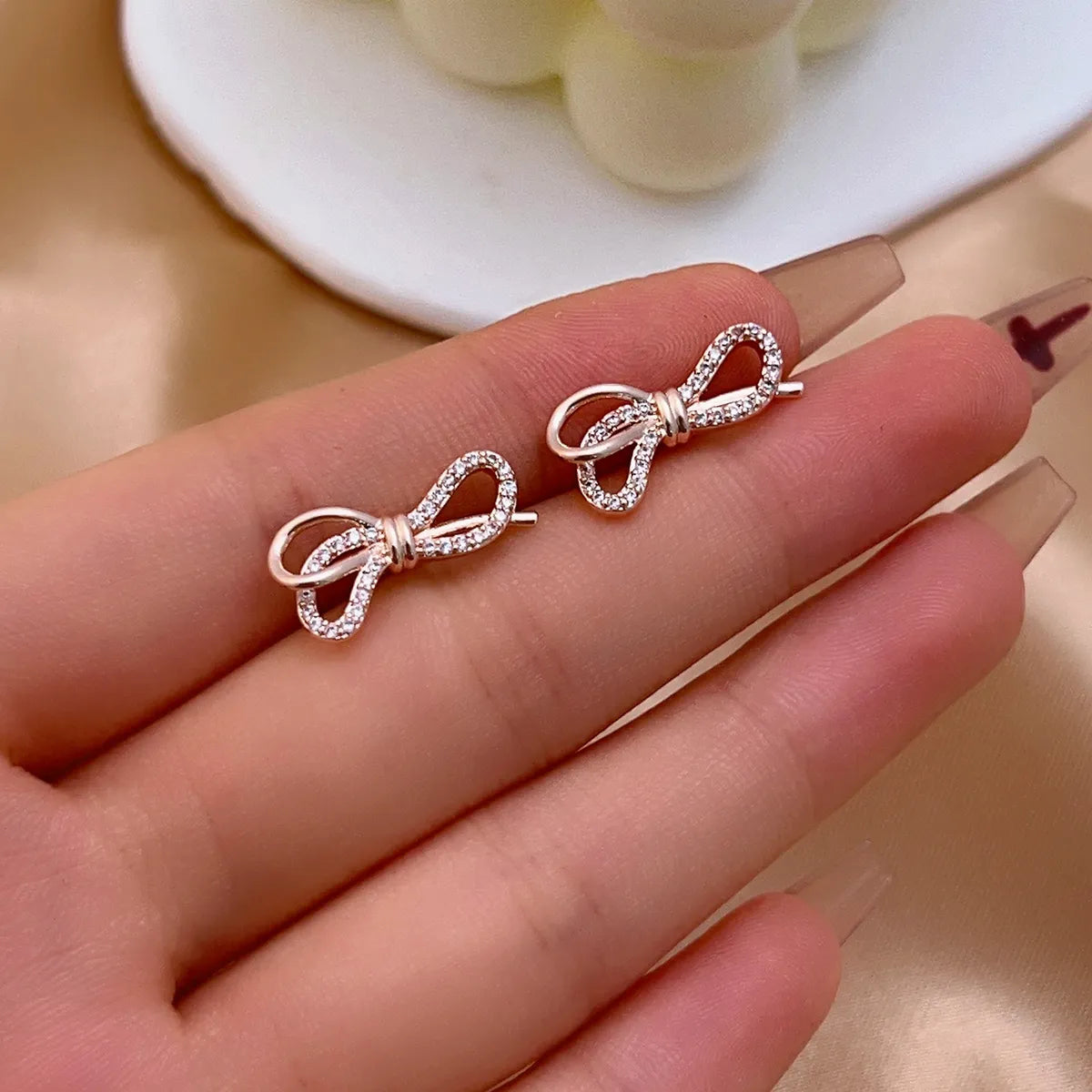 1 Pair Casual Simple Style Shiny Bow Knot Plating Inlay Copper Zircon Rose Gold Plated Ear Studs