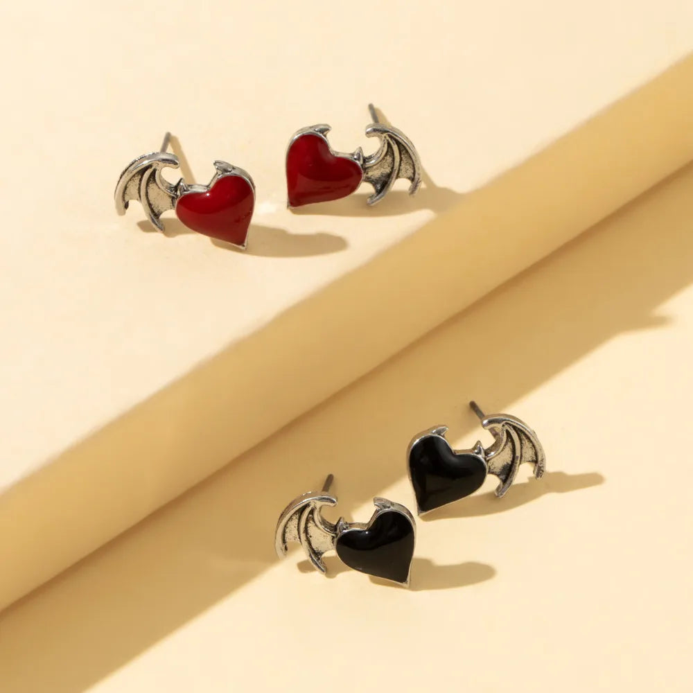 1 Pair Cool Style Heart Shape Wings Alloy Enamel Plating Women'S Ear Studs