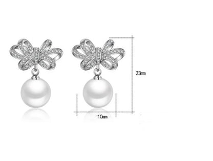 1 Pair Cute Sweet Bow Knot Plating Inlay Copper Pearl Zircon White Gold Plated Drop Earrings