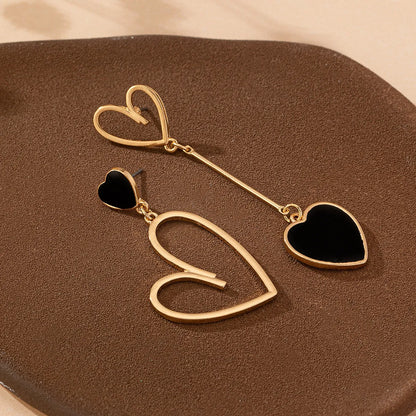 1 Pair Elegant Artistic Heart Shape Asymmetrical Hollow Out 201 Stainless Steel Zinc Alloy Drop Earrings