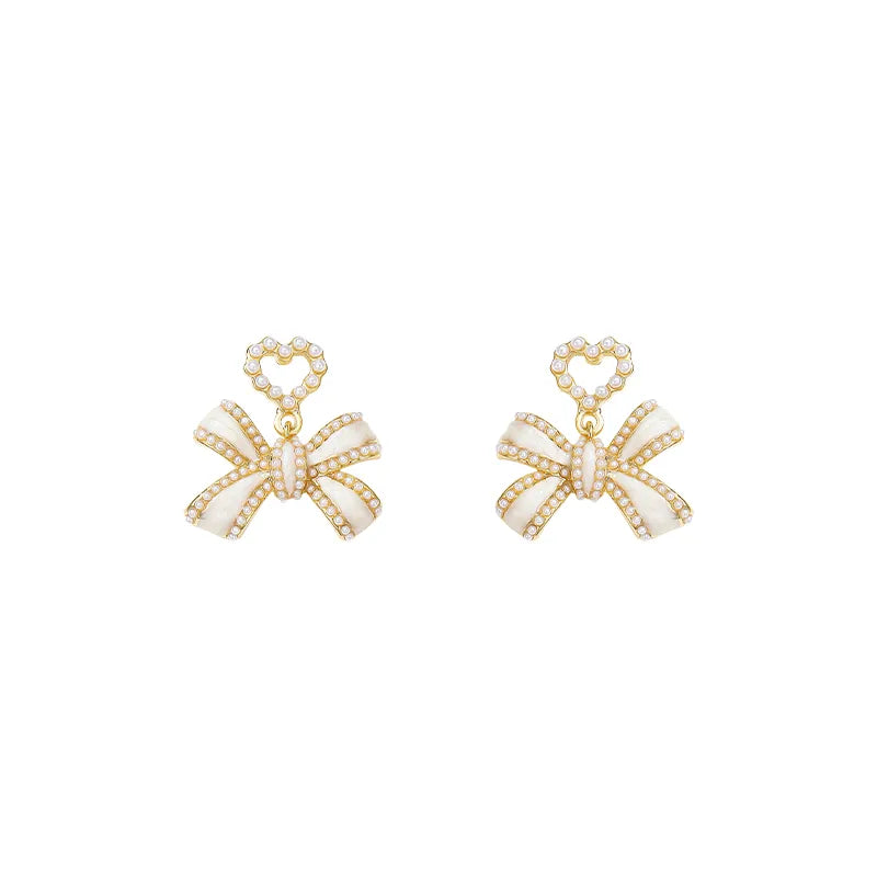 1 Pair Elegant Classic Style Streetwear Bow Knot Inlay Alloy Artificial Pearls Drop Earrings