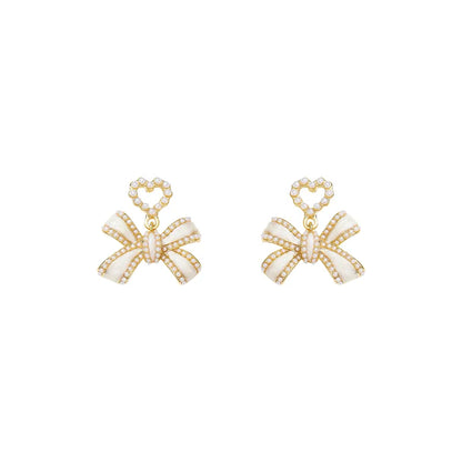 1 Pair Elegant Classic Style Streetwear Bow Knot Inlay Alloy Artificial Pearls Drop Earrings