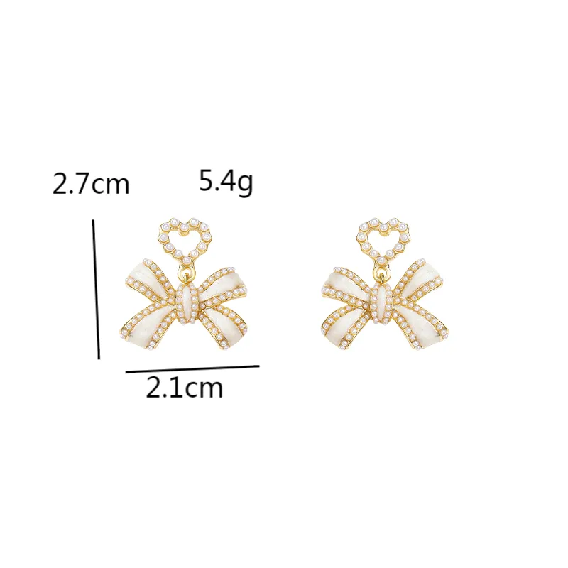 1 Pair Elegant Classic Style Streetwear Bow Knot Inlay Alloy Artificial Pearls Drop Earrings