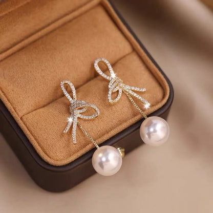 1 Pair Elegant Classic Style Streetwear Bow Knot Inlay Zinc Alloy Artificial Pearls Rhinestones Drop Earrings