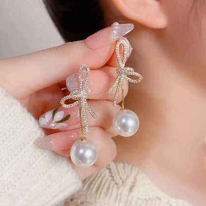 1 Pair Elegant Classic Style Streetwear Bow Knot Inlay Zinc Alloy Artificial Pearls Rhinestones Drop Earrings