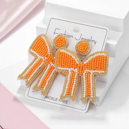 1 Pair Elegant Cute Bow Knot Handmade Bowknot Beaded Nonwoven Glass Drop Earrings