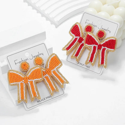 1 Pair Elegant Cute Bow Knot Handmade Bowknot Beaded Nonwoven Glass Drop Earrings