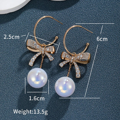 1 Pair Elegant Glam XUPING Bow Knot Inlay Alloy Copper Alloy Artificial Gemstones Artificial Pearls 18K Gold Plated Drop Earrings