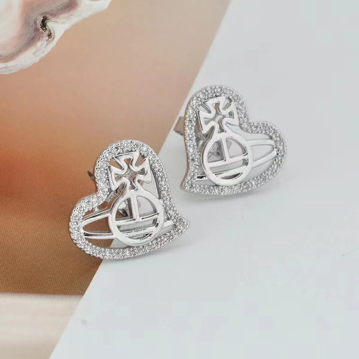 1 Pair Elegant Heart Shape Planet Plating Inlay Copper Zircon Ear Studs