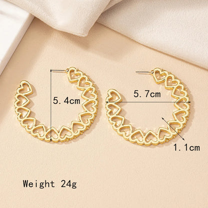 1 Pair Elegant Lady C Shape Heart Shape Plating Hollow Out Alloy 14k Gold Plated Ear Studs