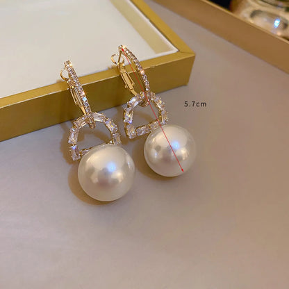 1 Pair Elegant Simple Style Round Plating Inlay Imitation Pearl Copper Artificial Rhinestones 14k Gold Plated Drop Earrings