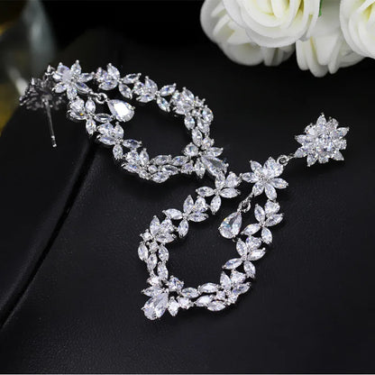 1 Pair Elegant Simple Style Shiny Water Droplets Flower Hollow Out Inlay Copper Zircon White Gold Plated Drop Earrings