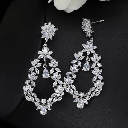 1 Pair Elegant Simple Style Shiny Water Droplets Flower Hollow Out Inlay Copper Zircon White Gold Plated Drop Earrings