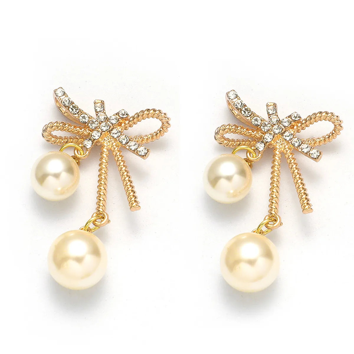 1 Pair Elegant Streetwear Bow Knot Inlay Alloy Artificial Pearls Gold Plated Drop Earrings