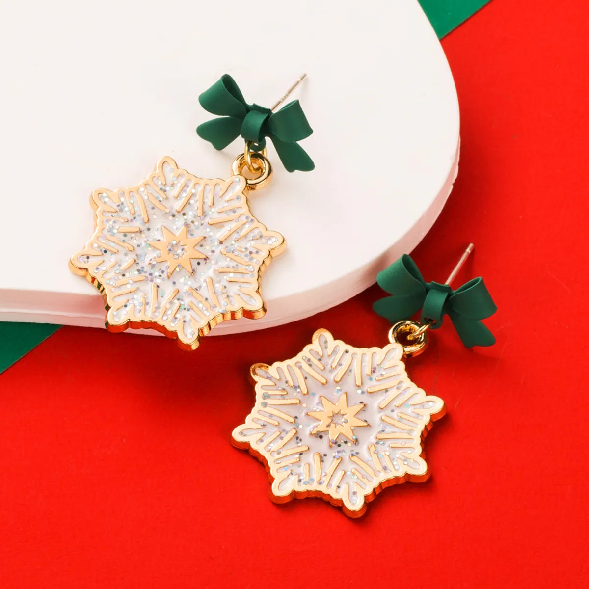 1 Pair Elegant Streetwear Bow Knot Snowflake Enamel Alloy Gold Plated Drop Earrings