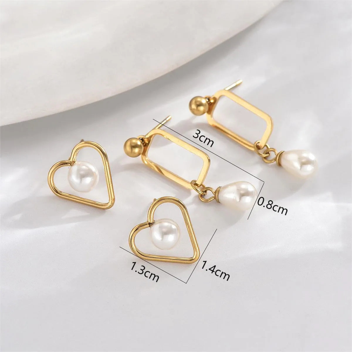 1 Pair Elegant Sweet Simple Style Heart Shape Rectangle Hollow Out Inlay Stainless Steel Artificial Pearls 14K Gold Plated Drop Earrings Ear Studs