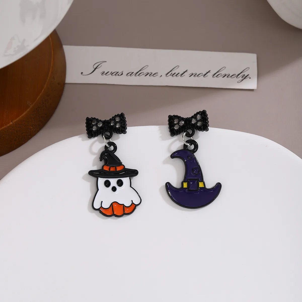 1 Pair Ethnic Style Cartoon Character Heart Shape Bow Knot Plating Alloy Drop Earrings