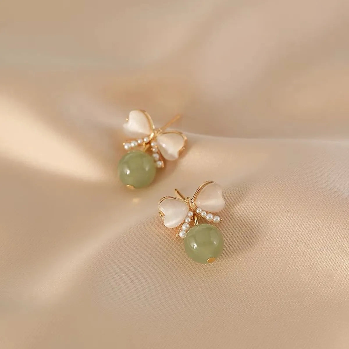 1 Pair Fairy Style Bow Knot Alloy Plating Artificial Pearls Opal Women's Drop Earrings