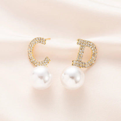 1 Pair Fashion C Shape Letter Asymmetrical Plating Inlay Copper Pearl Zircon 18k Gold Plated Drop Earrings