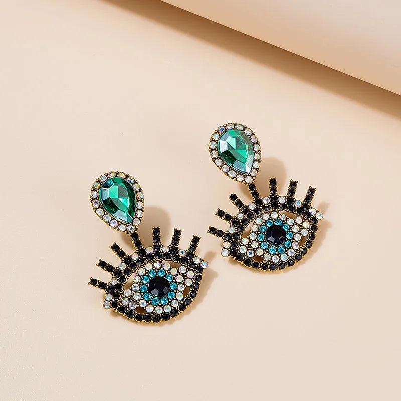 1 Pair Fashion Devil'S Eye Owl Alloy Inlay Artificial Rhinestones Women'S Earrings