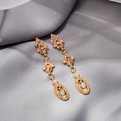 1 Pair Fashion Devil'S Eye Owl Alloy Inlay Artificial Rhinestones Women'S Earrings