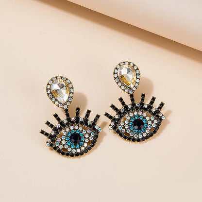 1 Pair Fashion Devil'S Eye Owl Alloy Inlay Artificial Rhinestones Women'S Earrings