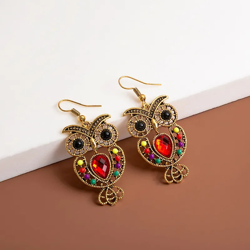 1 Pair Fashion Devil'S Eye Owl Alloy Inlay Artificial Rhinestones Women'S Earrings