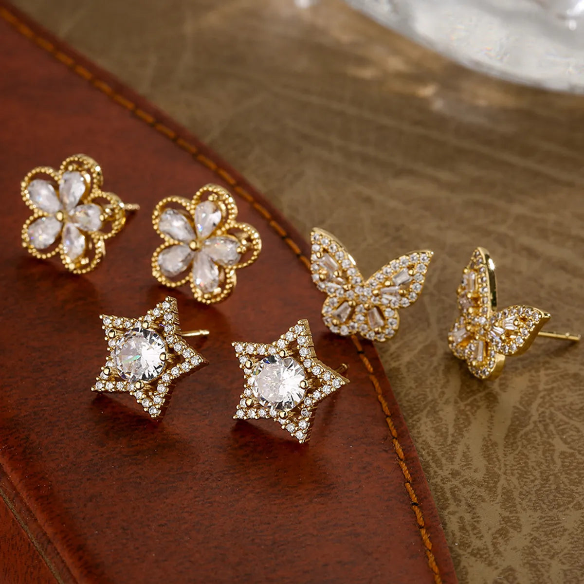 1 Pair Fashion Star Flower Butterfly Inlay Copper Zircon 18k Gold Plated Ear Studs