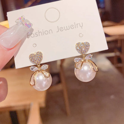 1 Pair Ig Style Korean Style Heart Shape Bow Knot Plating Inlay Imitation Pearl Alloy Zircon Drop Earrings