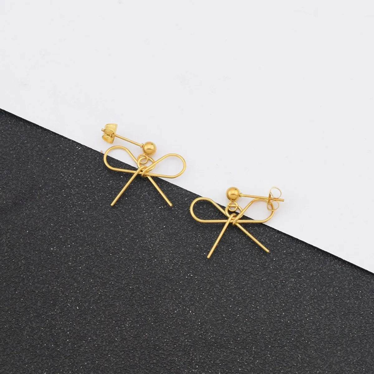 1 Pair IG Style Simple Style Bow Knot Plating Hollow Out Stainless Steel Drop Earrings