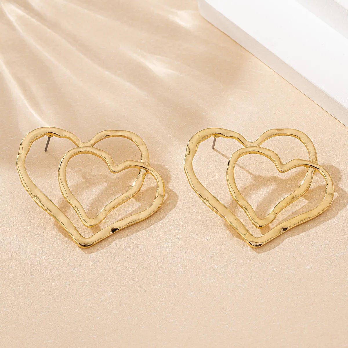 1 Pair IG Style Simple Style Heart Shape Hollow Out Zinc Alloy Ear Studs