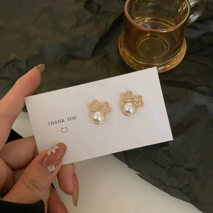 1 Pair Lady Korean Style Bow Knot Plating Inlay Alloy Artificial Rhinestones Artificial Pearls Gold Plated Ear Studs