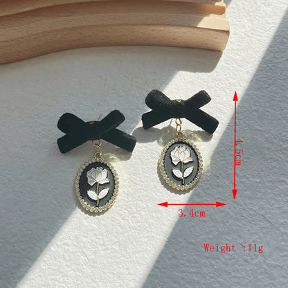 1 Pair Retro Classic Style Flower Bow Knot Plating Imitation Pearl Alloy 14k Gold Plated Drop Earrings