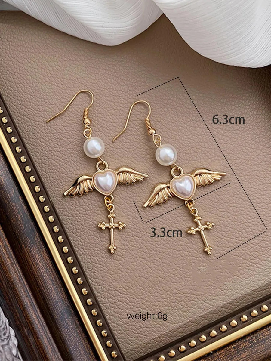 1 Pair Retro Cross Heart Shape Inlay Alloy Artificial Pearls Gold Plated Drop Earrings