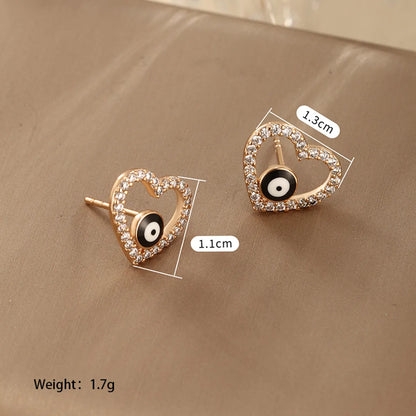 1 Pair Retro Xuping Devil'S Eye Eye Plating Inlay Alloy Copper Alloy Artificial Gemstones 18k Gold Plated Ear Studs