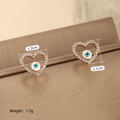 1 Pair Retro Xuping Devil'S Eye Eye Plating Inlay Alloy Copper Alloy Artificial Gemstones 18k Gold Plated Ear Studs