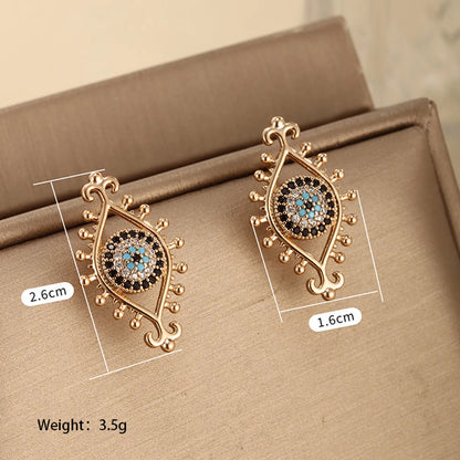 1 Pair Retro Xuping Devil's Eye Plating Inlay Alloy Copper Alloy Artificial Gemstones 18k Gold Plated Ear Studs