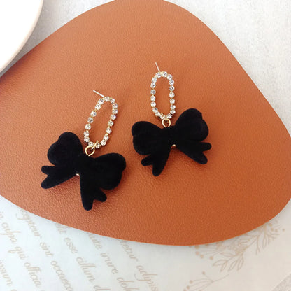 1 Pair Simple Style Bow Knot Flannel Inlay Artificial Diamond Women'S Drop Earrings