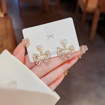 1 Pair Simple Style Bow Knot Inlay Alloy Zircon Drop Earrings