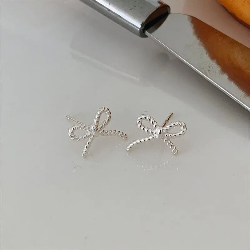 1 Pair Simple Style Bow Knot Plating Sterling Silver Ear Studs