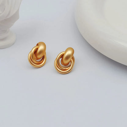 1 Pair Simple Style Circle Flower Plating Iron Ear Studs