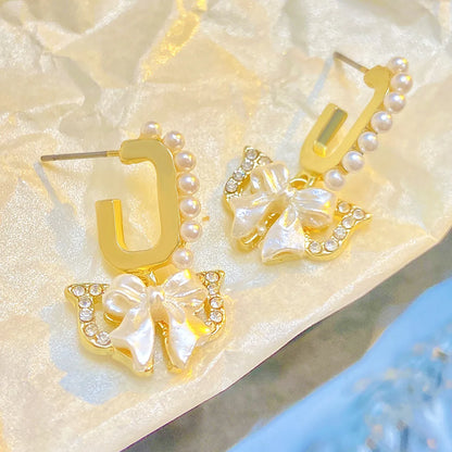 1 Pair Simple Style Classic Style Bow Knot Inlay Alloy Rhinestones Drop Earrings