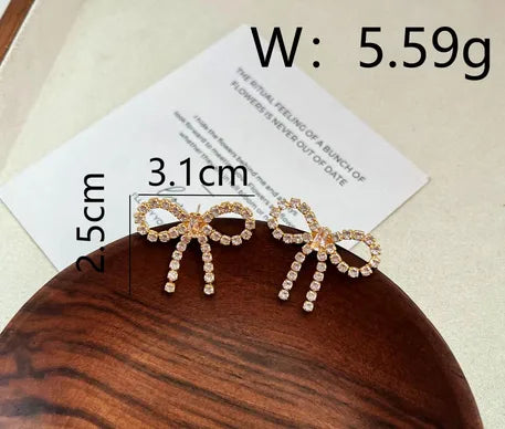 1 Pair Simple Style Classic Style Commute Bow Knot Plating Inlay Copper Rhinestones Ear Studs