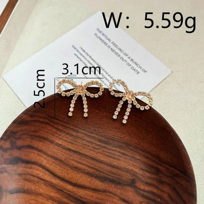 1 Pair Simple Style Classic Style Commute Bow Knot Plating Inlay Copper Rhinestones Ear Studs