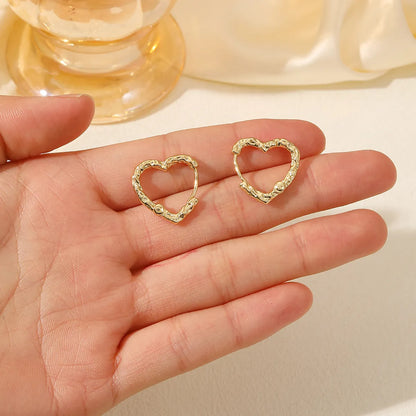 1 Pair Simple Style Classic Style Commute Heart Shape Hollow Out Copper 18K Gold Plated Earrings