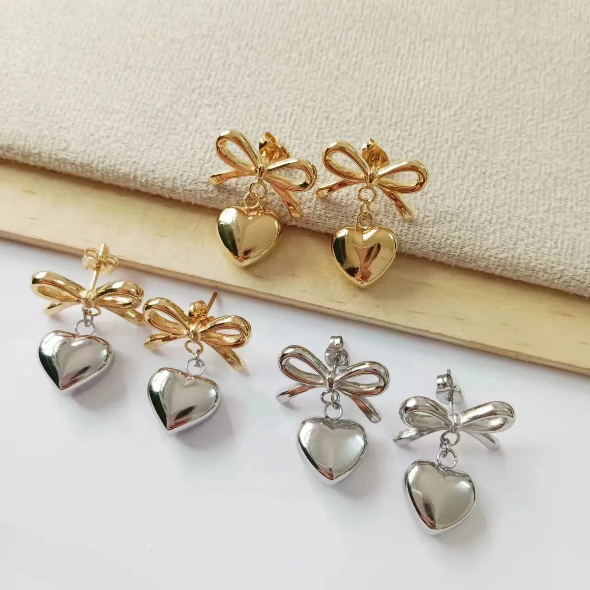 1 Pair Simple Style Classic Style Heart Shape Bow Knot Plating Titanium Steel Drop Earrings