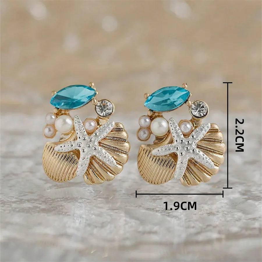 1 Pair Simple Style Classic Style Starfish Inlay Zinc Alloy Pearl Zircon 14K Gold Plated Ear Studs